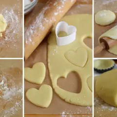 Preparazione di biscotti pasta frolla a forma di cuore. L'impasto viene steso e tagliato con un coppapasta.