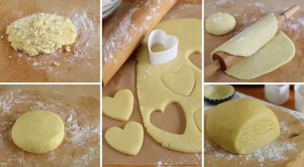 Preparazione di biscotti pasta frolla a forma di cuore. L'impasto viene steso e tagliato con un coppapasta.
